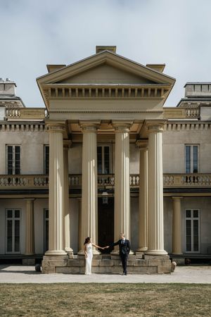Elegant neoclassical mansion with white columns and portico features multiple exterior views showing its grand architectural details.