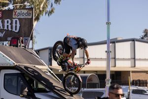 Albury Wodonga event photography by Jason Robins capturing an action shot of a stunt motorcycle rider performing at a regional show.