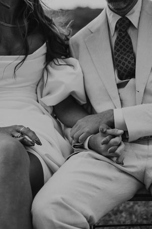 A series of black and white photographs showing hands holding and examining a medical device during a consultation.