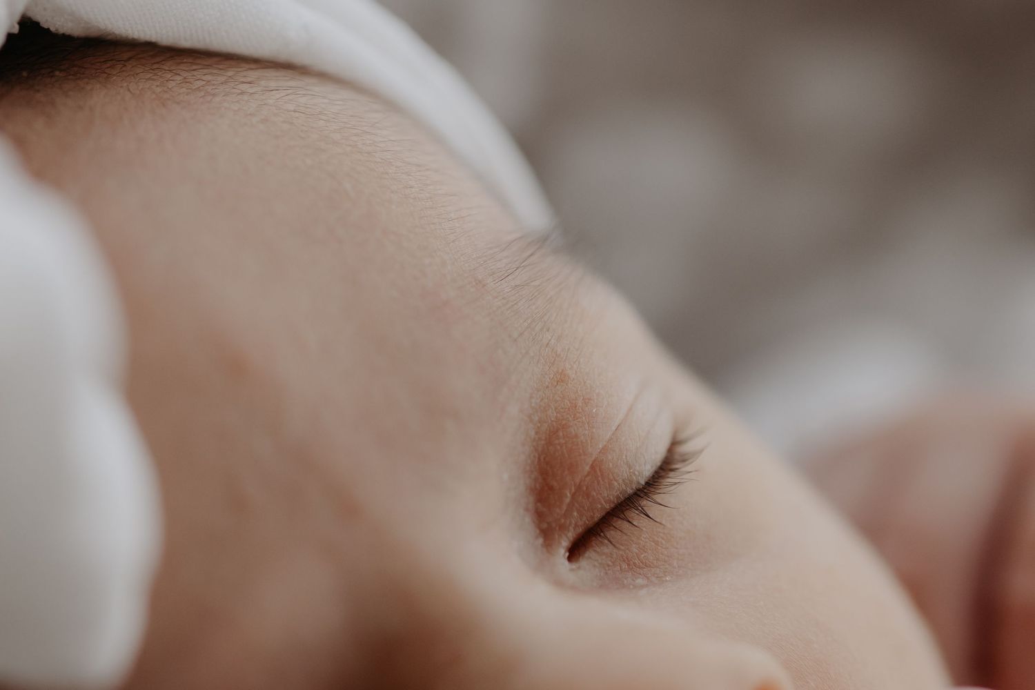 Close up of newborn baby's eye.