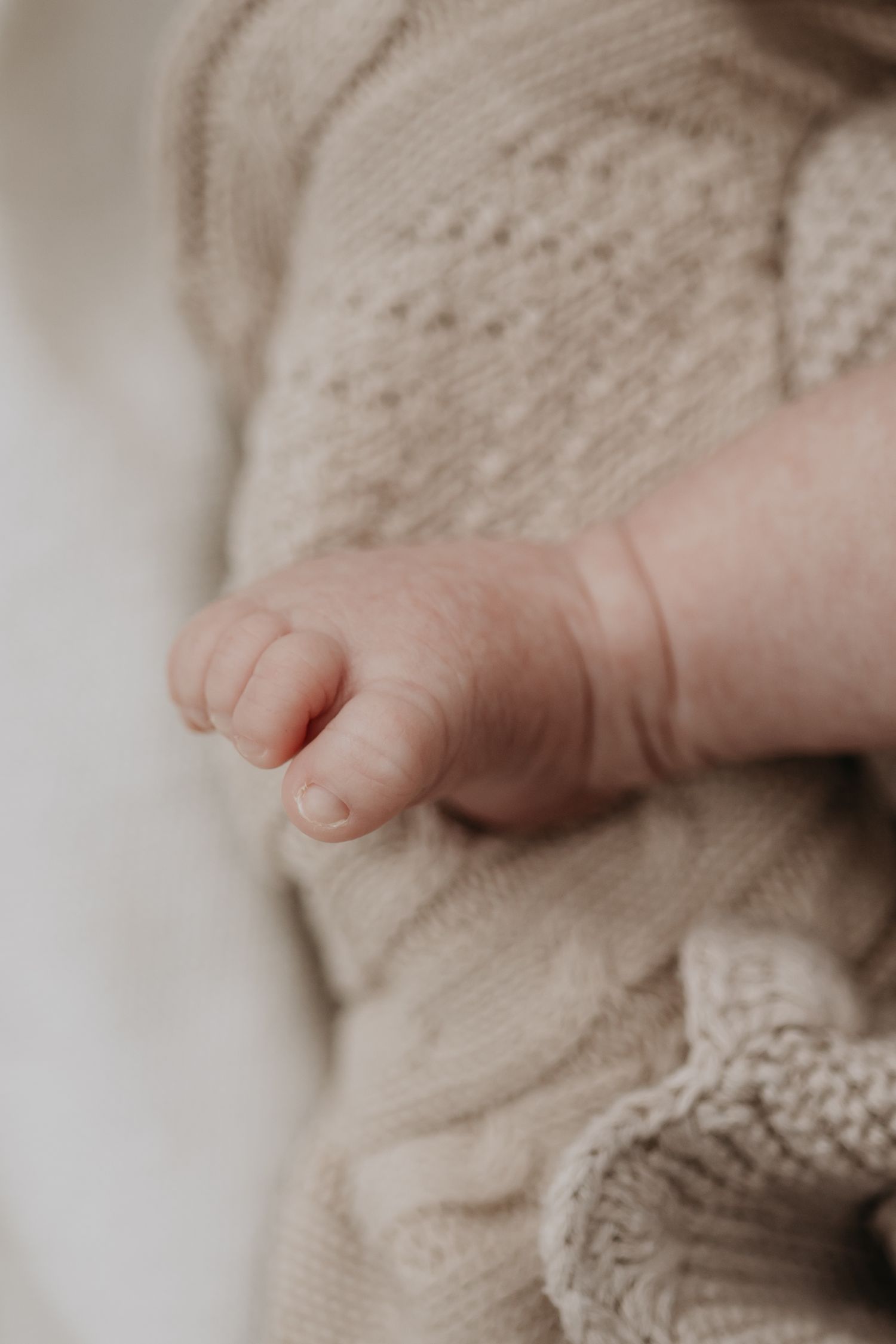 Close up of newborn baby's foot.