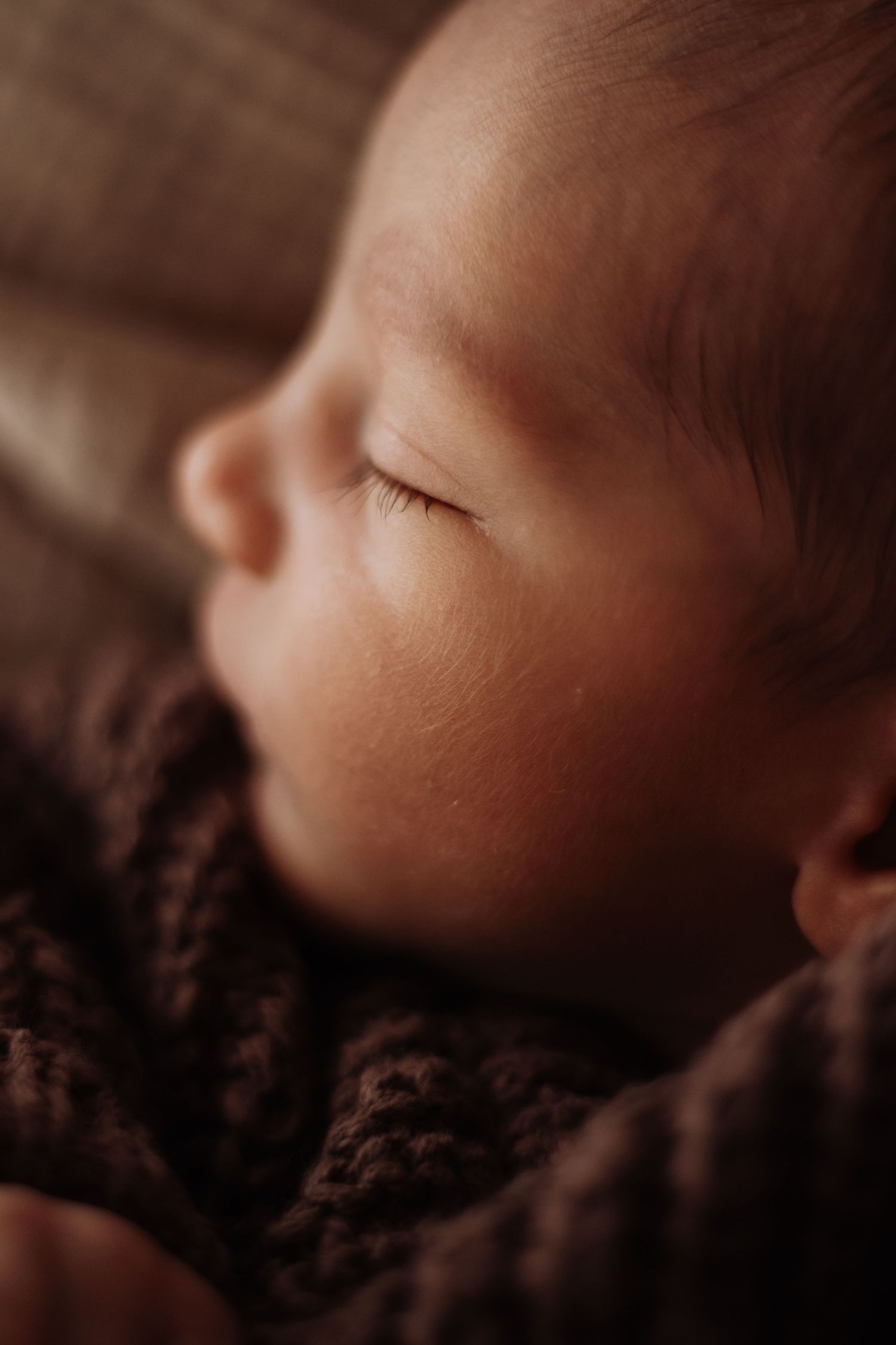Close up of newborn baby's face.