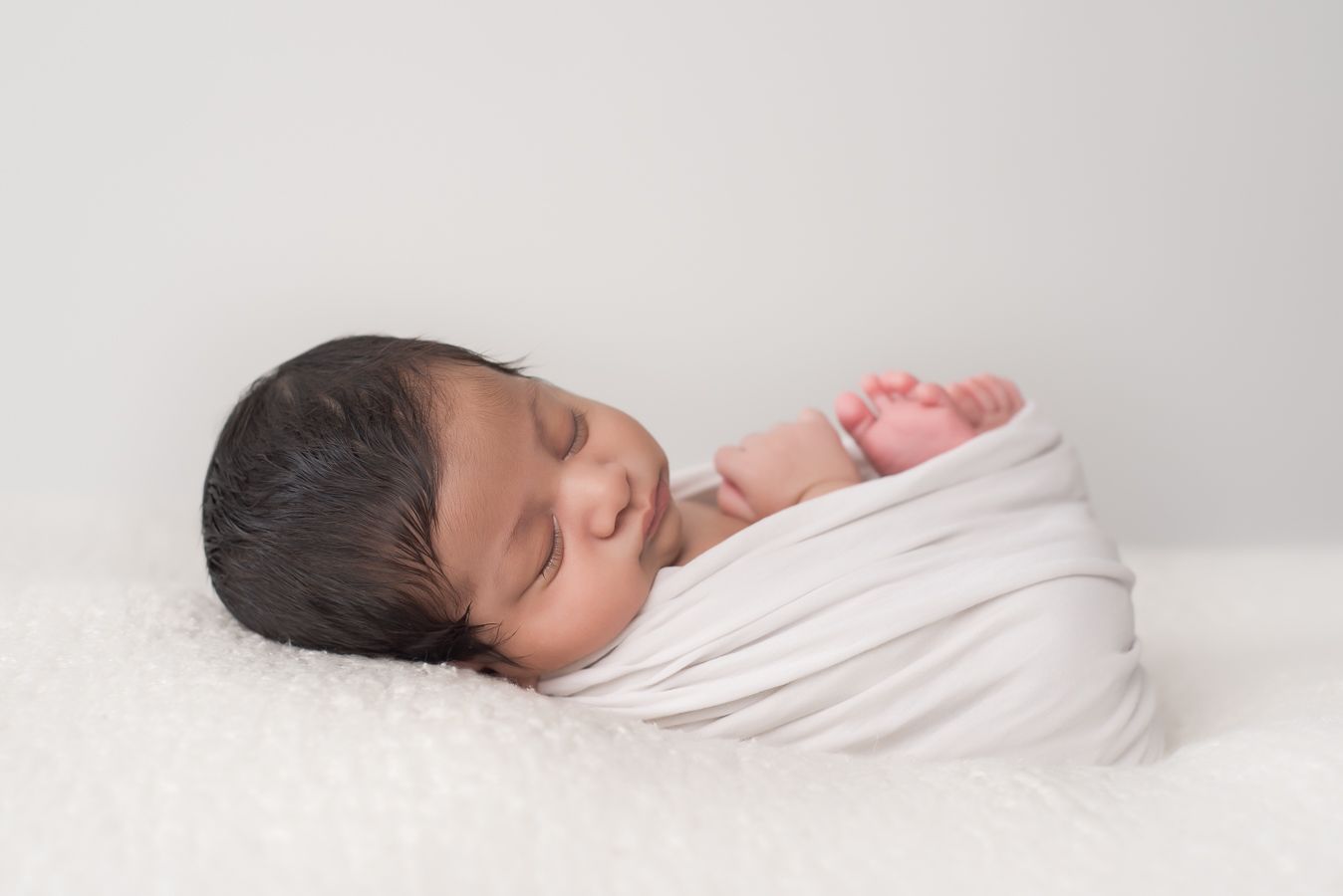 wrapped newborn in white Halifax studio photography