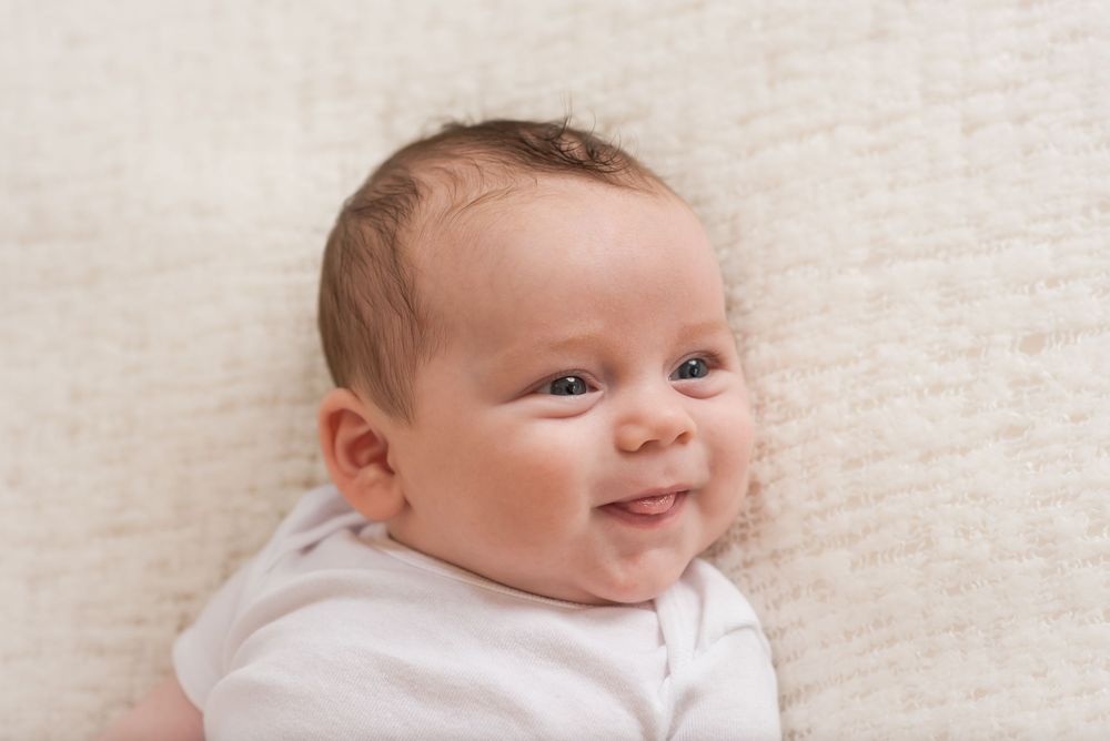 awake baby sticking tongue out expressive baby photography Halifax studio