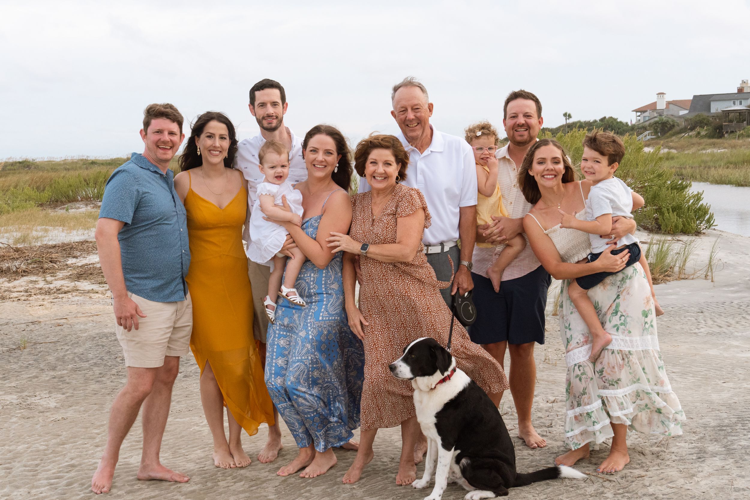 family photographer on beach at sunset on east beach Saint Simons
