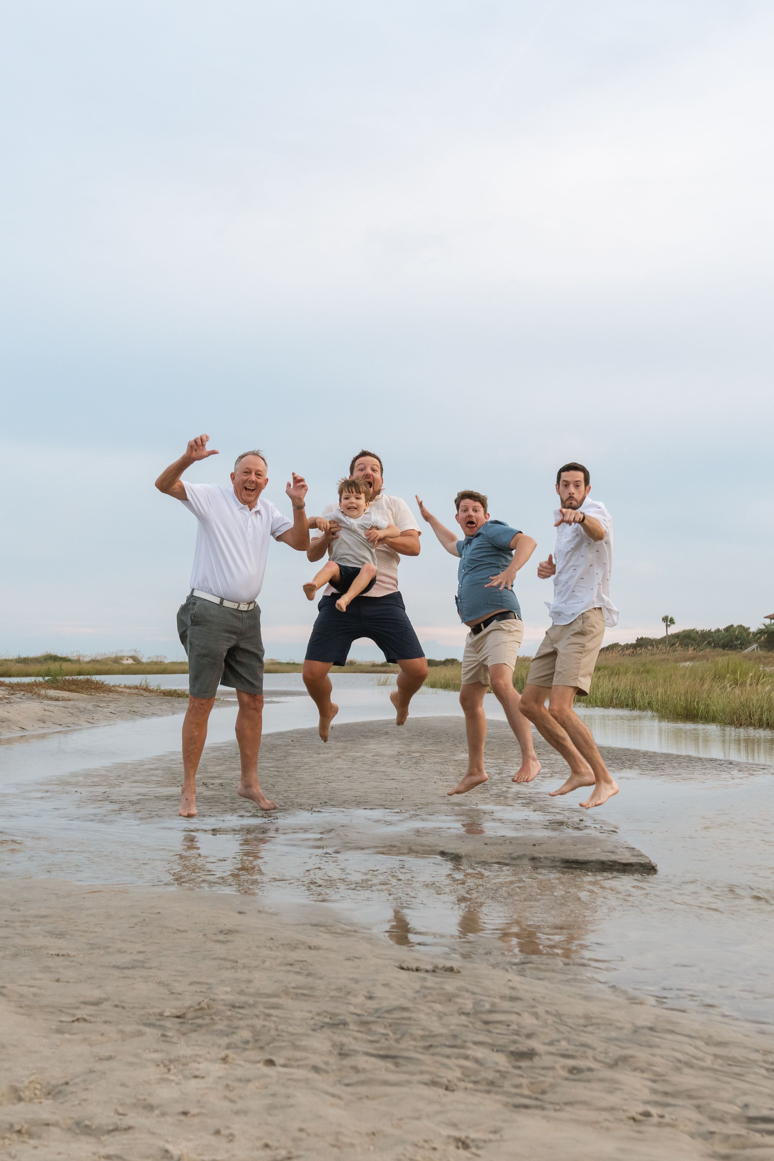 photographer saint simons family on beach for extended family pictures sunset and sunrise east beach beaches St. Simons Island Georgia marsh