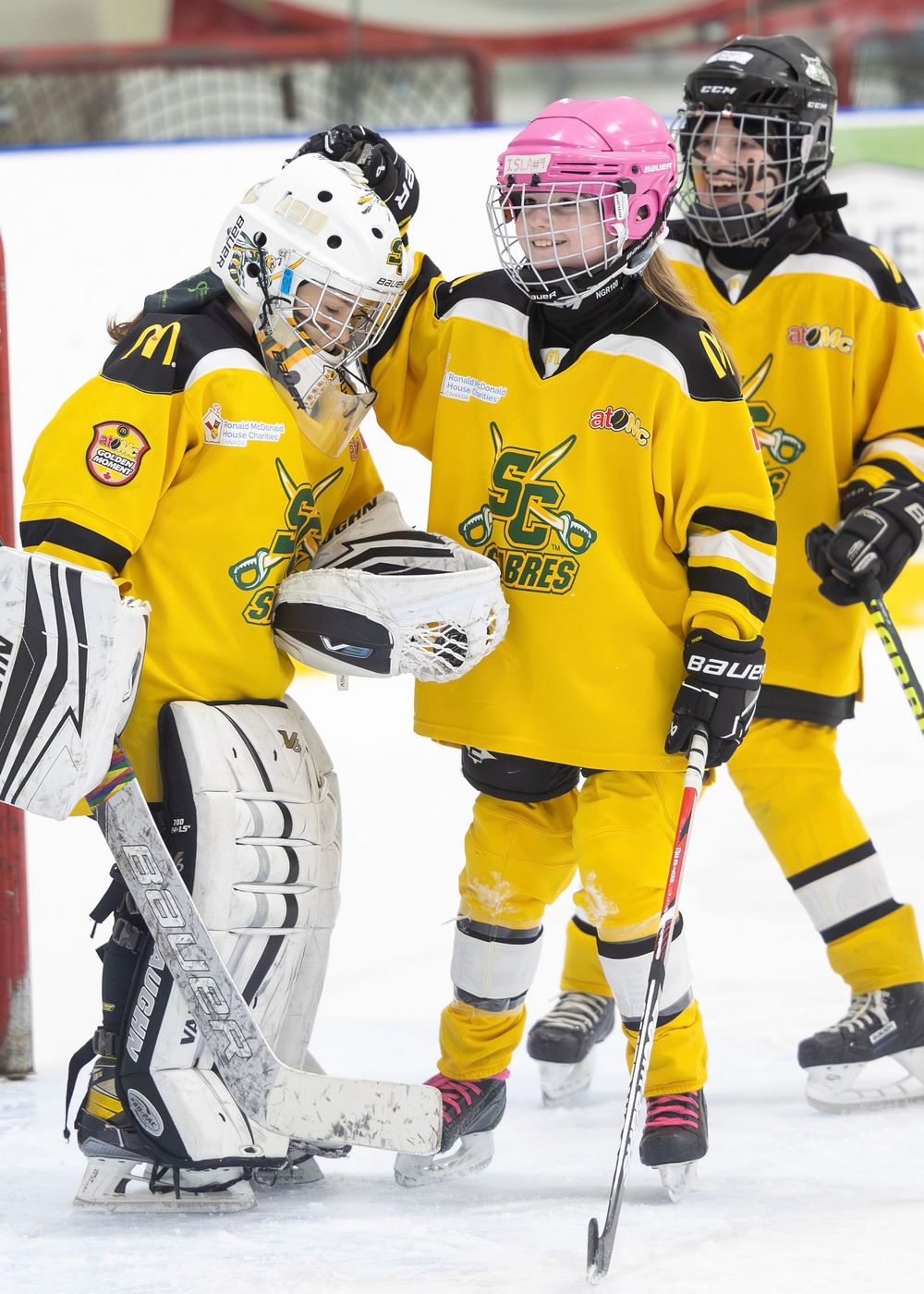 Stoney Creek Sabres Girls hockey players during game