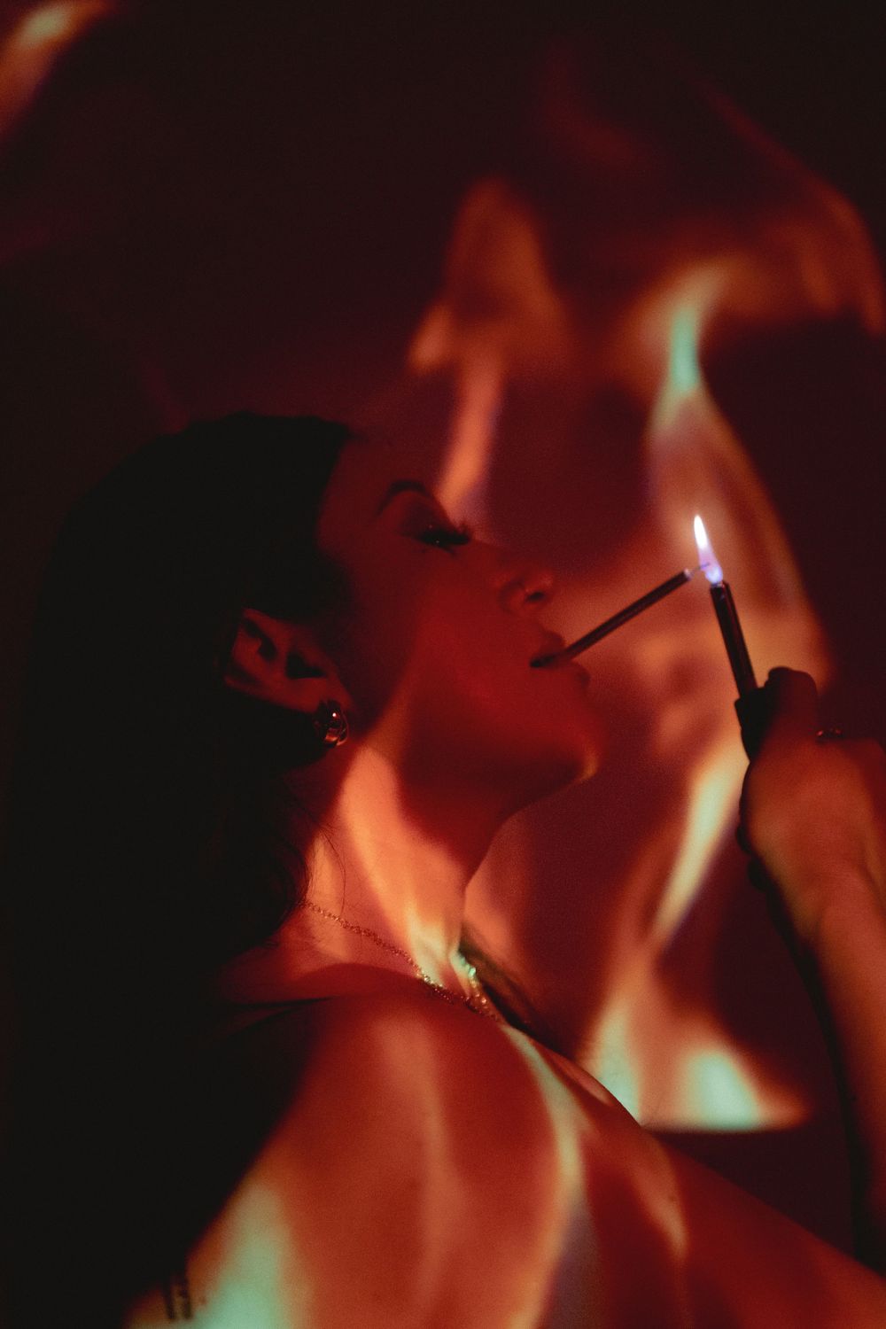 Artistic photo with match lighting creating dramatic fire effects.