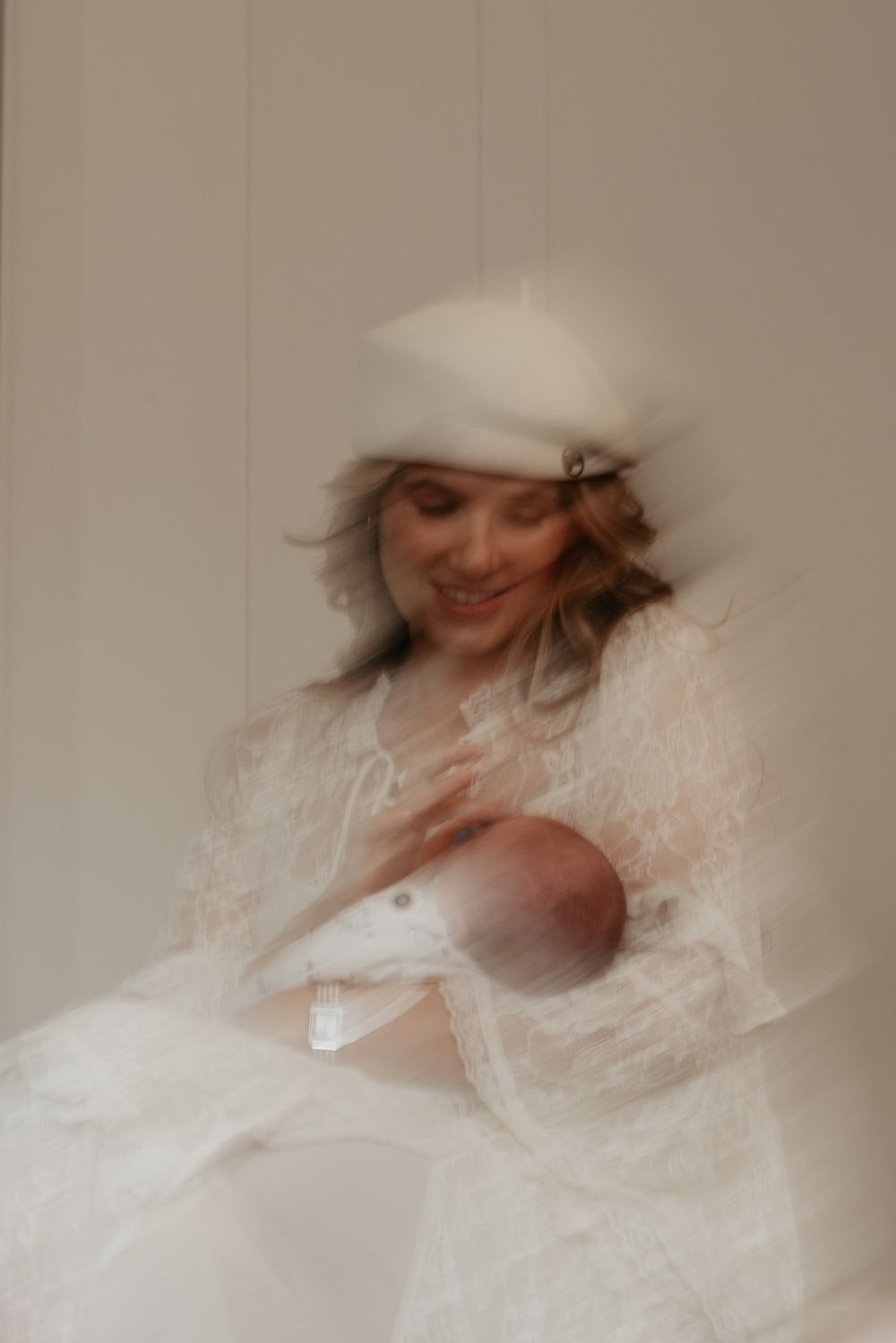 A series of ethereal portraits in white lace with motion blur creating a dreamy, romantic effect.