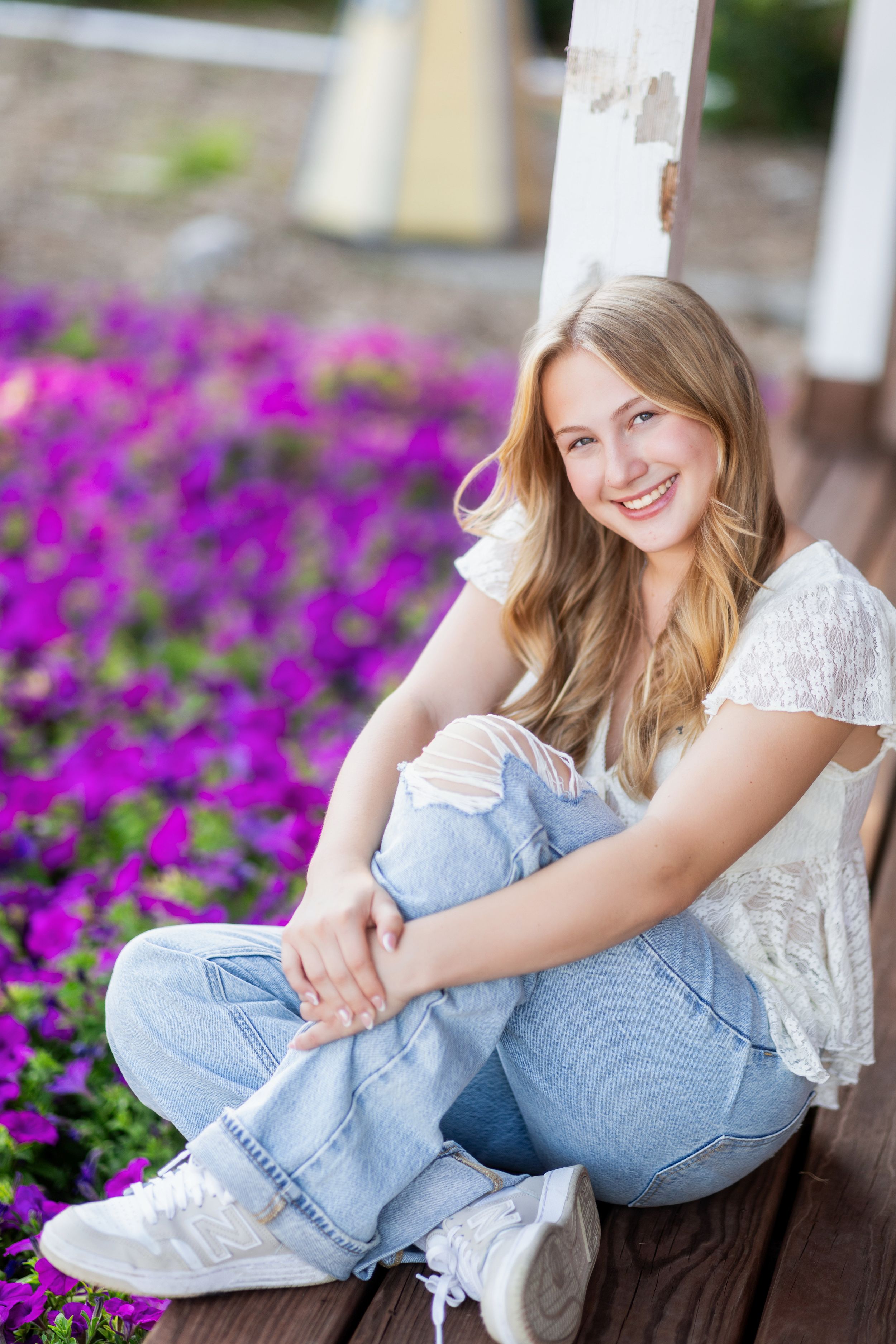 A series of casual outdoor portraits showing someone in light blue jeans and white lace top sitting on wooden steps.