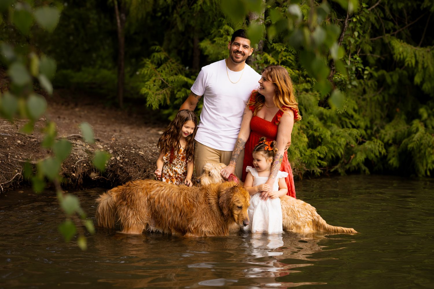 Andrea and her family pose for a photo with their dogs in Lake Tapps.