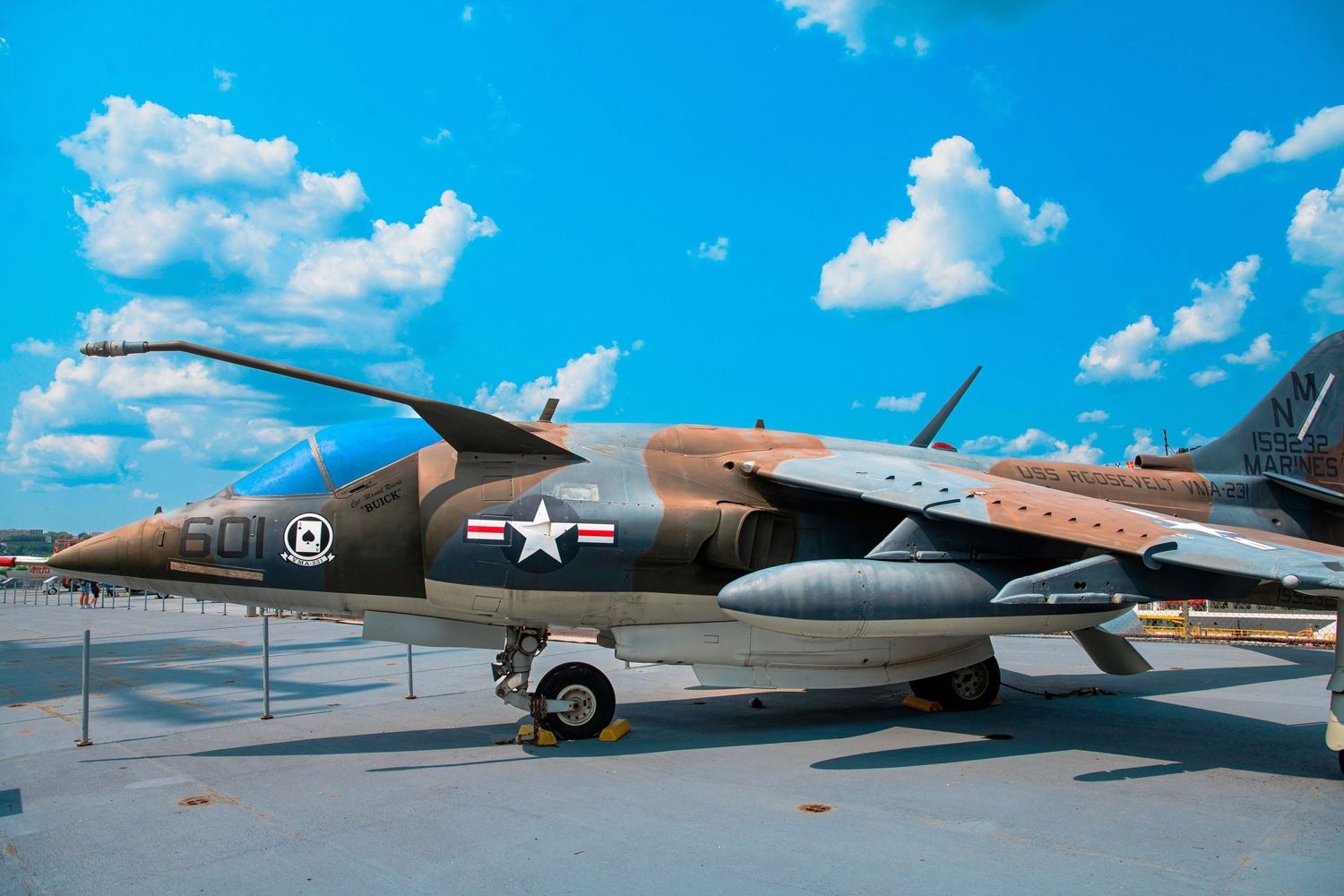 A brown camouflaged military fighter jet with US Air Force markings on display.