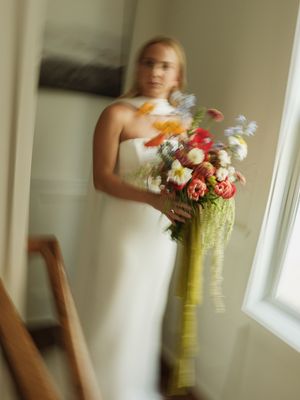 Motion-blurred images of colorful wedding bouquets with red and white flowers.