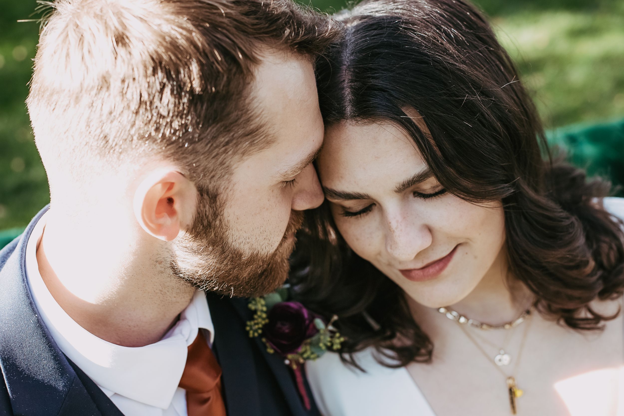 Series of intimate wedding portraits with couple sharing tender moments outdoors.