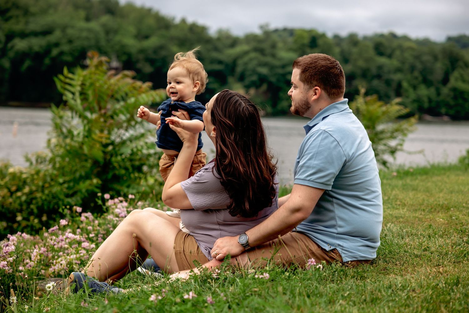 Couple sitting on cement steps during engagement session, west virginia