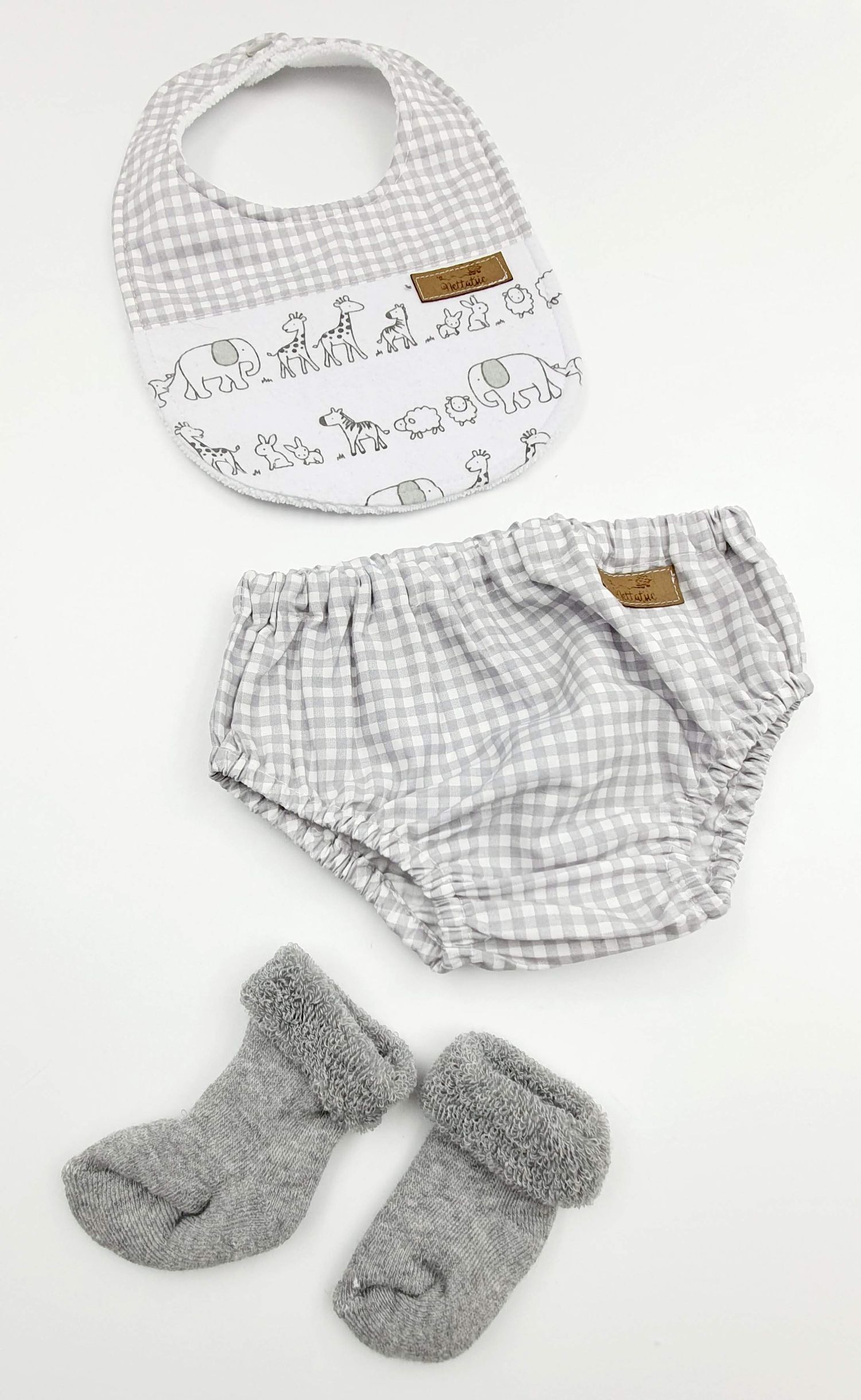 Gray gingham baby set with animal print bib, bloomers and fuzzy socks.