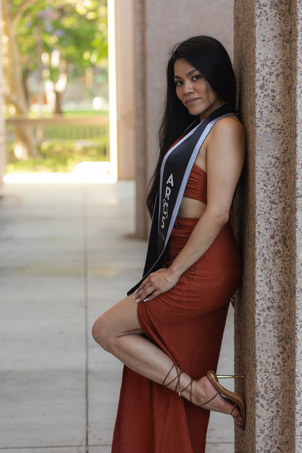 Graduation photoshoot shot at CSUN, California State University of Northridge. Female graduate photographed with style and intent.