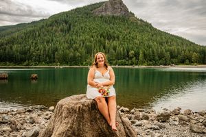 A panoramic series of scenic mountain lake views with evergreen forests and rocky shoreline in summer.