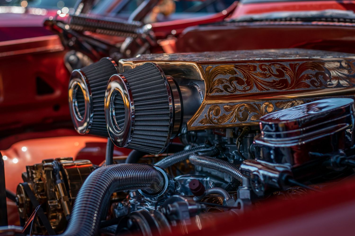 Close-up detail of classic car engine components and mechanical parts.