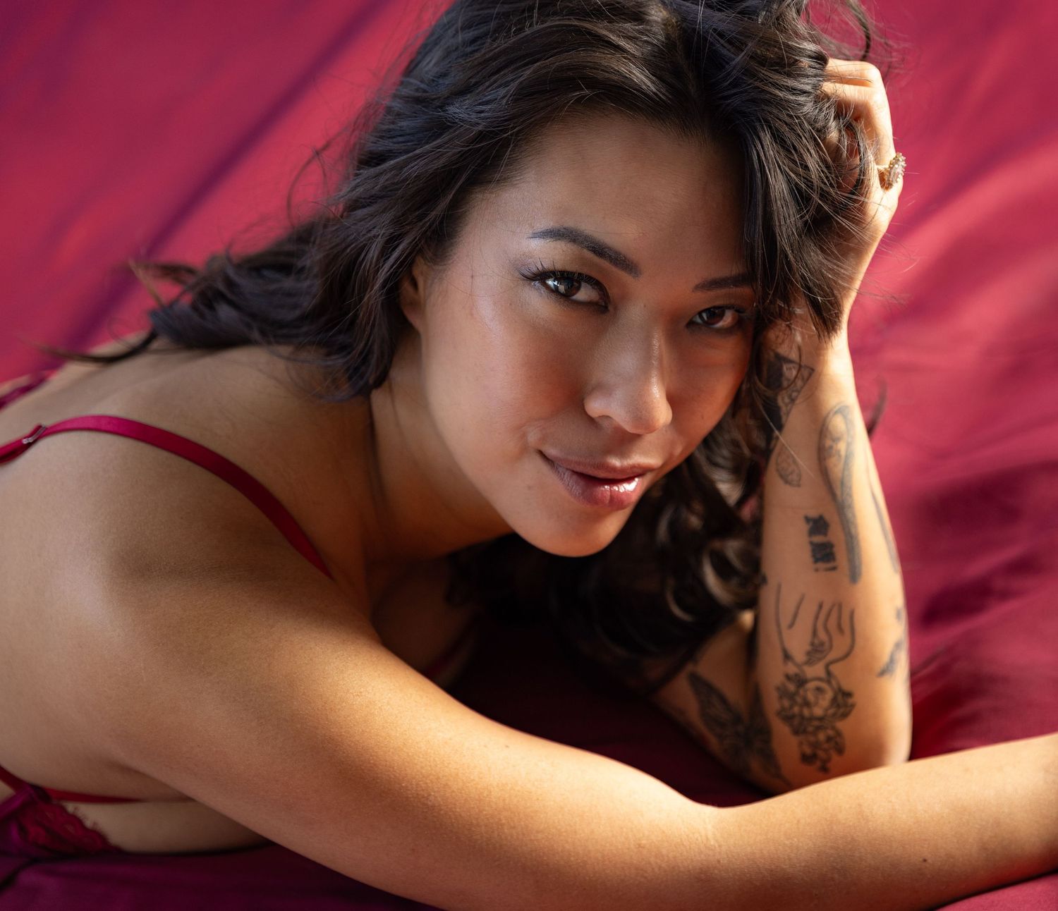 Woman captured during glamour photo shoot in Los Angeles studio.
