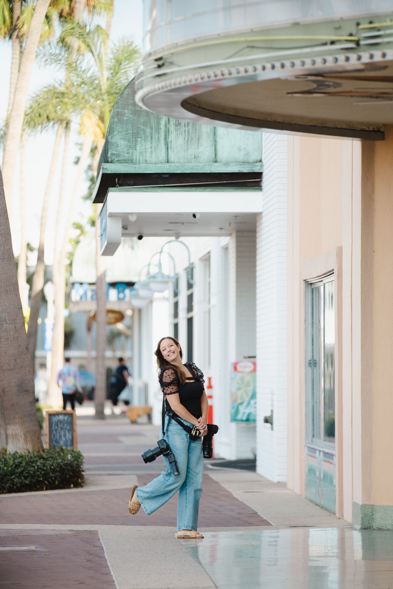 BTS of Meagan Kenny on set photographing a romantic proposal