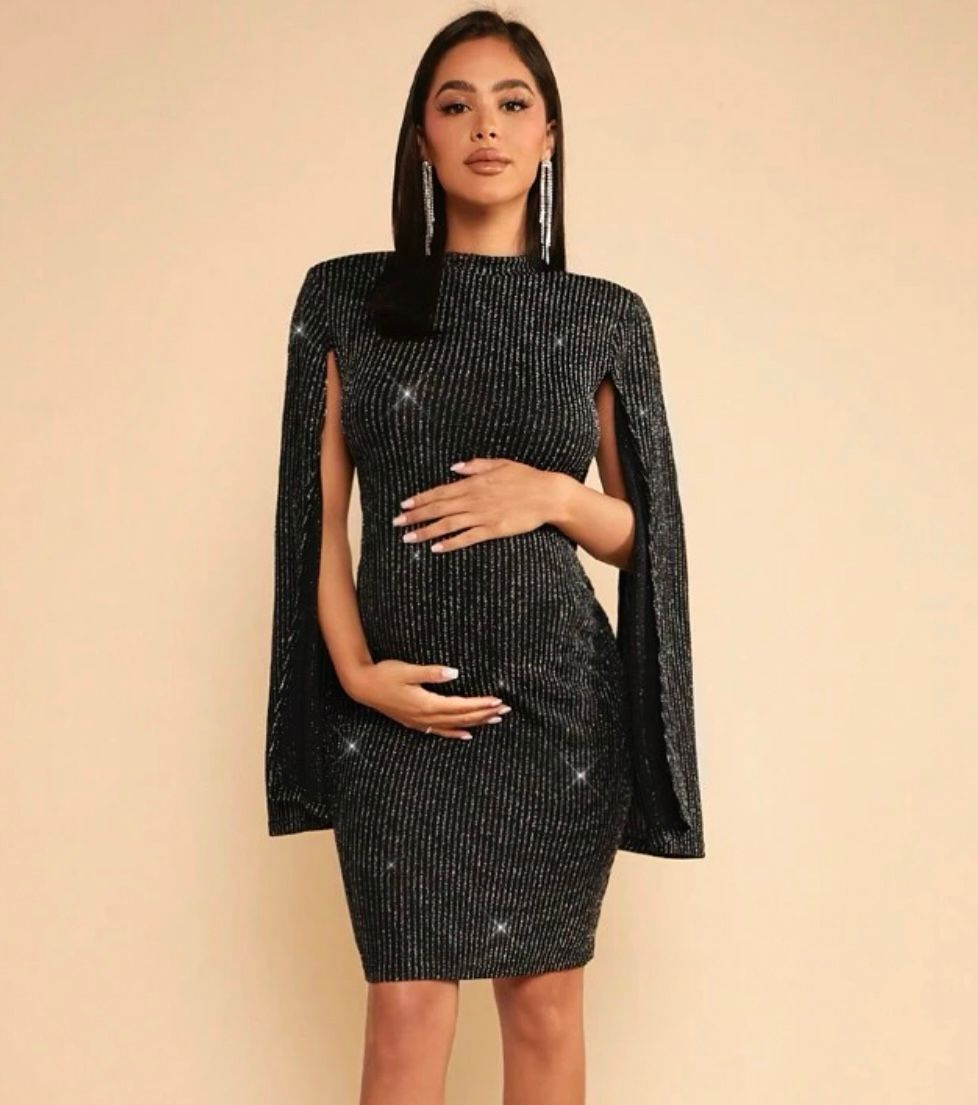A sparkly black mini dress with cape sleeves captured in multiple angles.