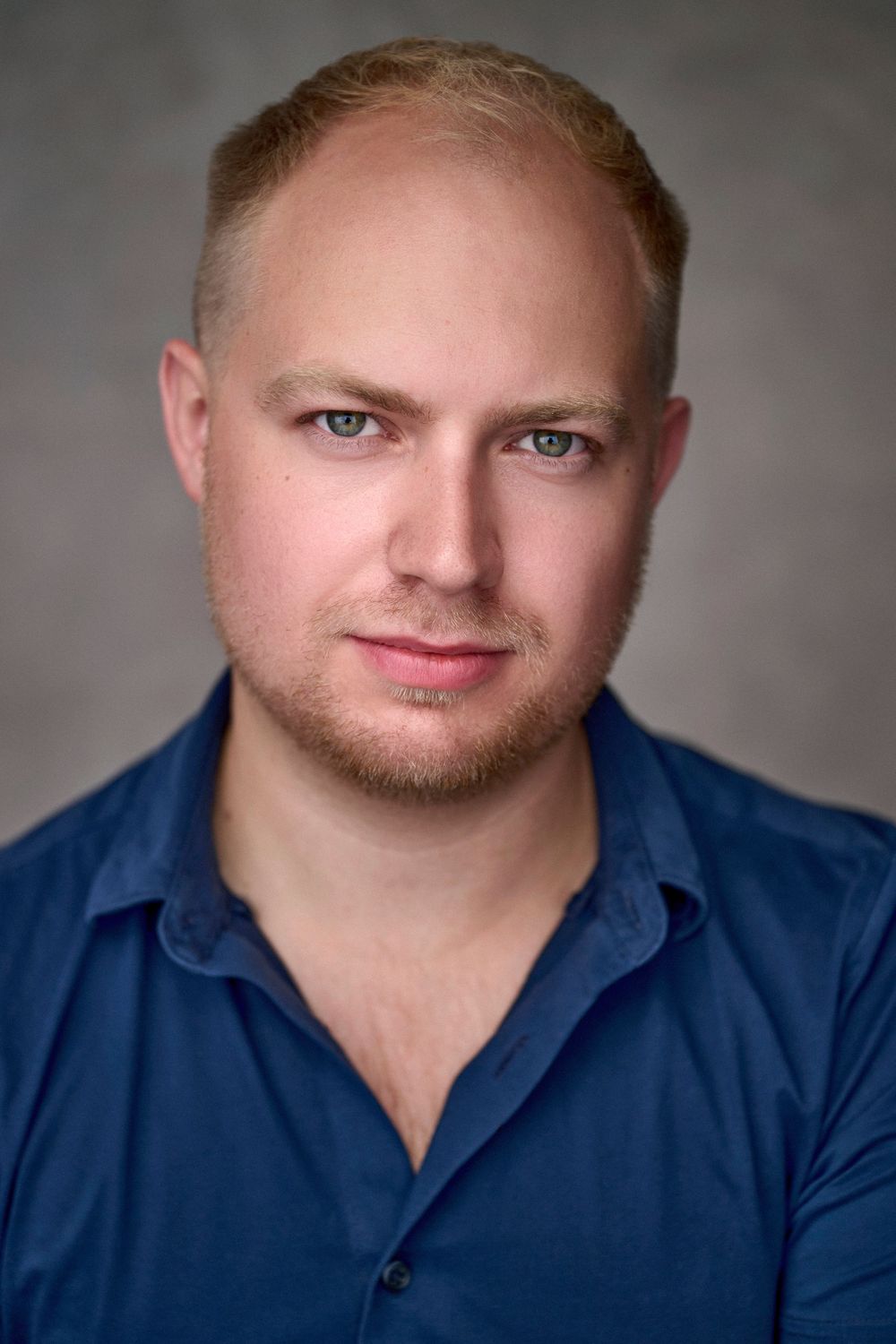 Headshot of actor Sam Bolt shot in the London studio