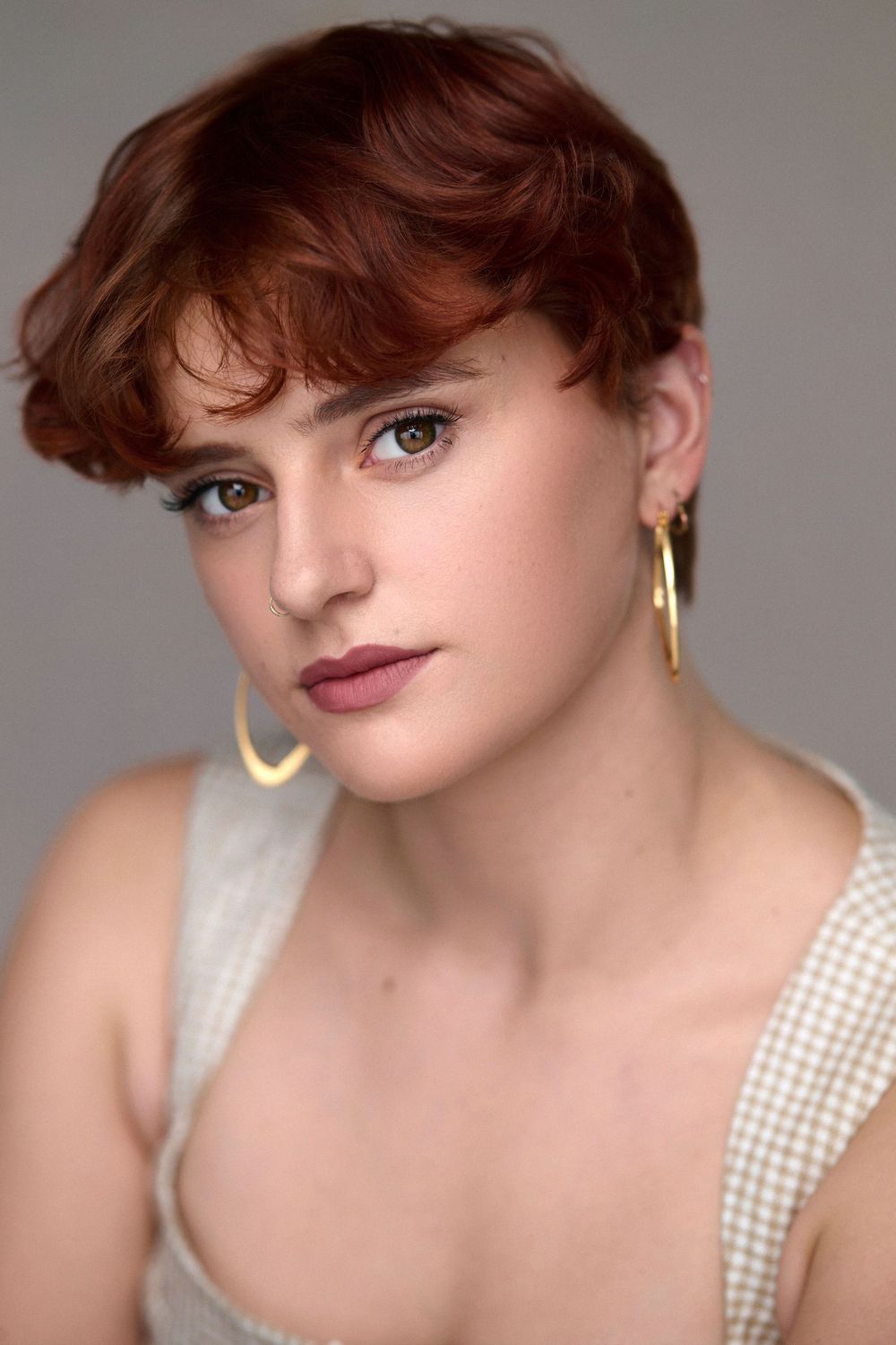 Headshot of singer and dancer Amy Springett shot in the London studio