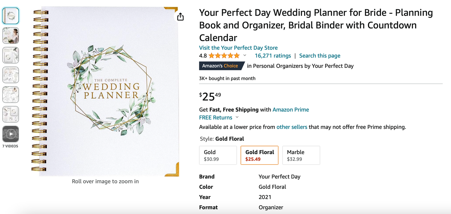 Wedding planner book with floral design and gold accents shown in product listing.