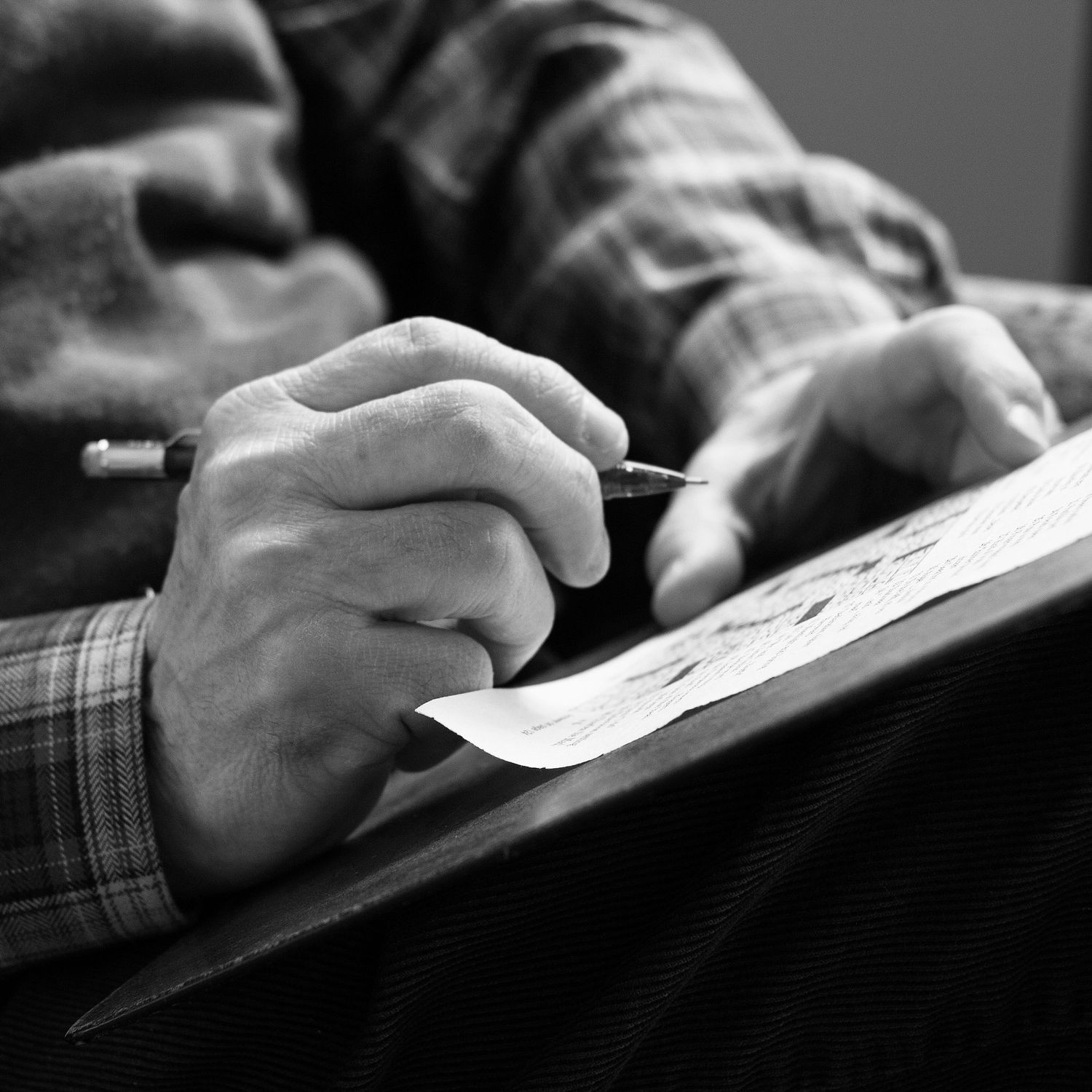 wrinkled hands writing