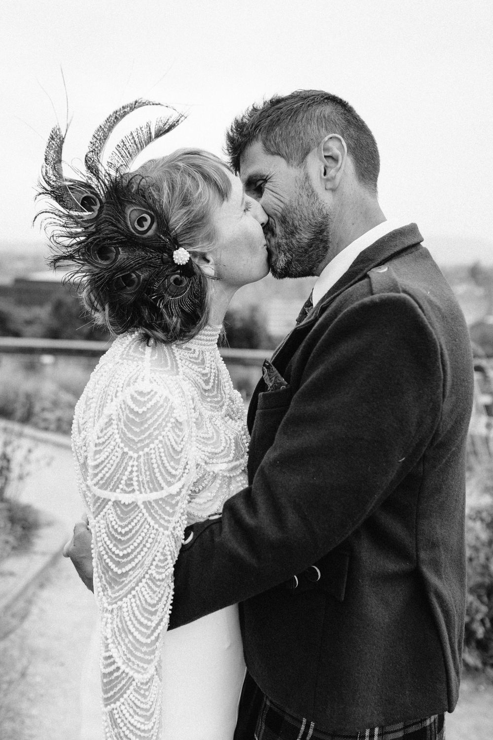 Intimate black and white portraits of a bride and groom sharing romantic moments.