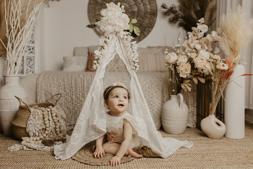 Rustic neutral-toned photo collage featuring vintage decor, lace fabrics, and dried floral arrangements in a warm sepia palette.