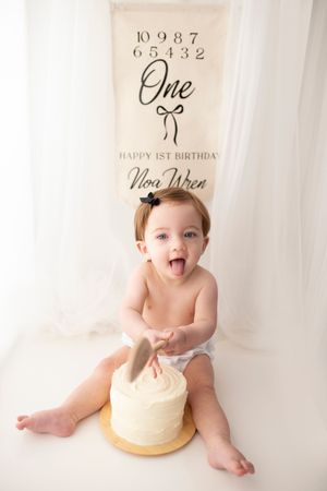Tasteful classic cake smash photoshoot by little wonderland photography widnes cheshire