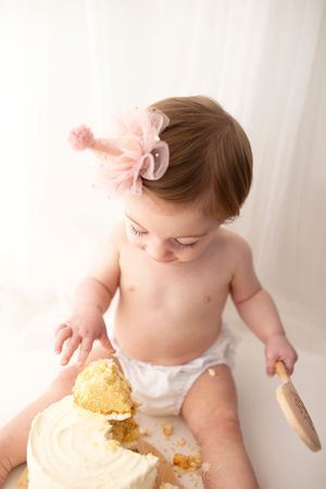 Tasteful classic cake smash photoshoot by little wonderland photography widnes cheshire