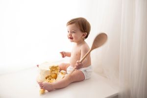 Tasteful classic cake smash photoshoot by little wonderland photography widnes cheshire first birthday photoshoot