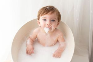 Tasteful classic cake smash photoshoot by little wonderland photography widnes cheshire first birthday photoshoot