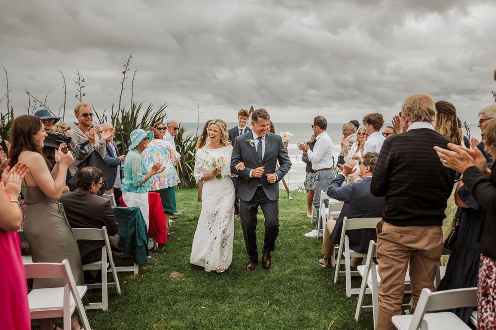 French Wedding at Castaway resort  couple walking down the Aisle. Auckland Wedding