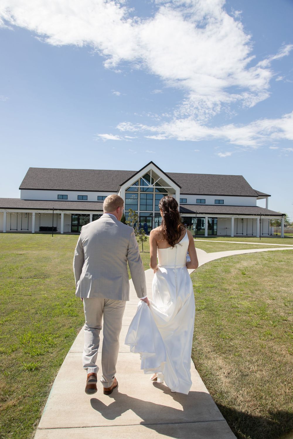 Newly Weds walking at The Gardenia wedding venue,  Wedding in Dallas Texas,  Stephenville Couples Photographer,