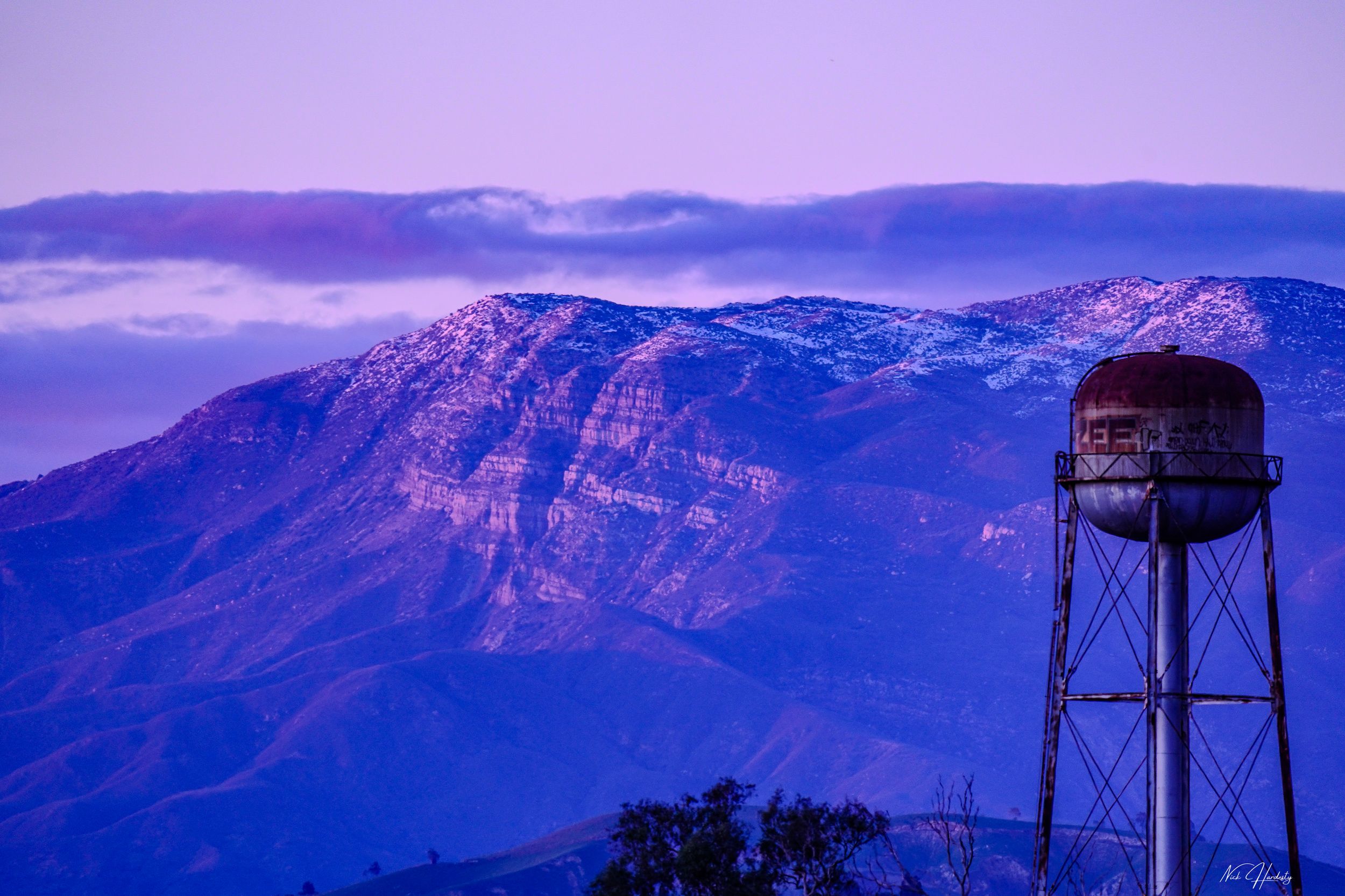 Purple-hued sunset over Topa Topa mountains in Ventura, California.
