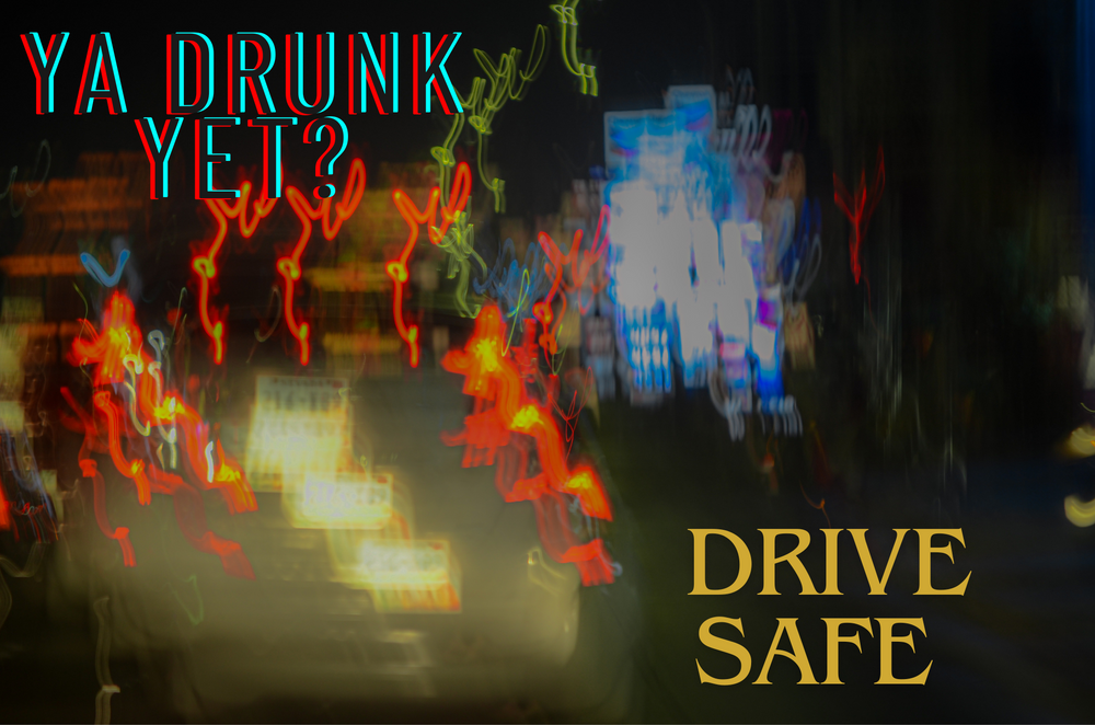 Glowing red and yellow text warning against drunk driving on dark background.