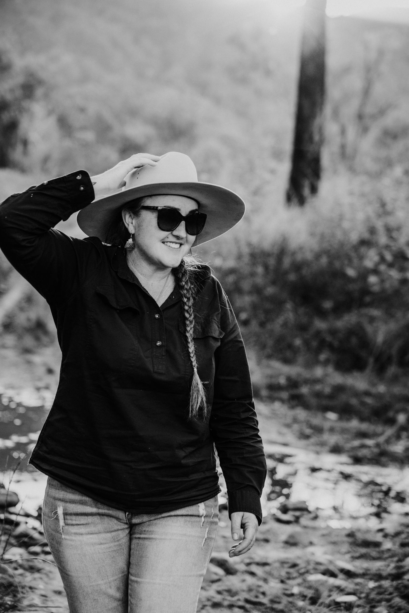 Country girl with cowboy hat on Airlie Beach Whitsundays photographer penny