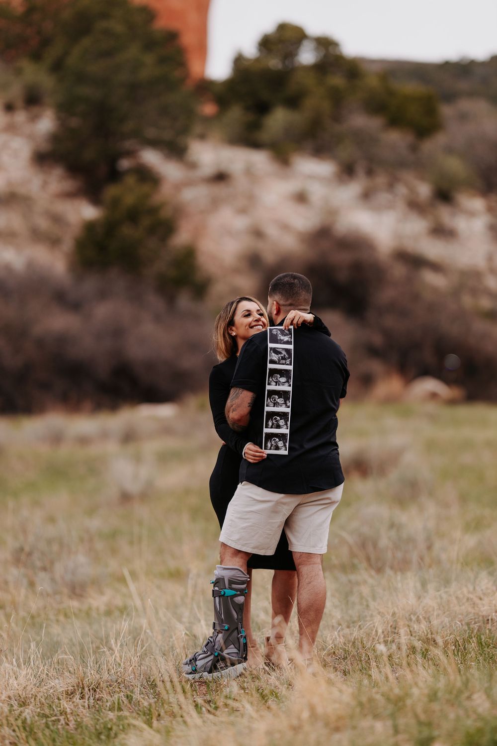 couple in front of garden of the gods