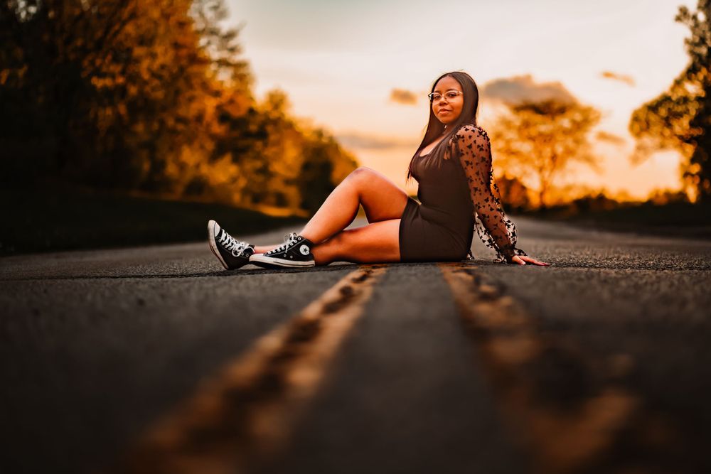 Creative and unique location for senior portraits. Session took place in downtown Linden, Michigan
