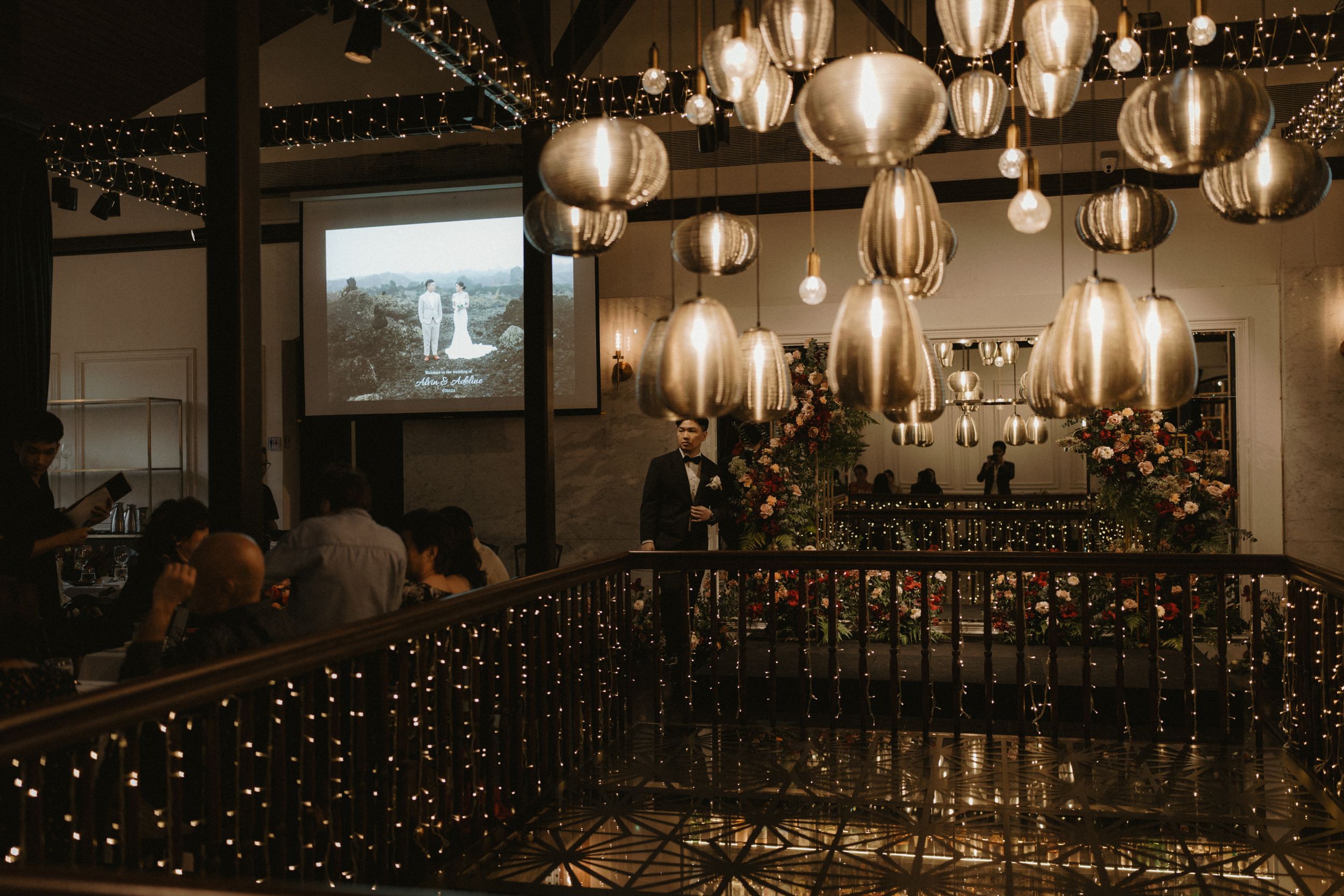 Atmospheric restaurant interior with hanging paper lanterns creating warm ambient lighting.