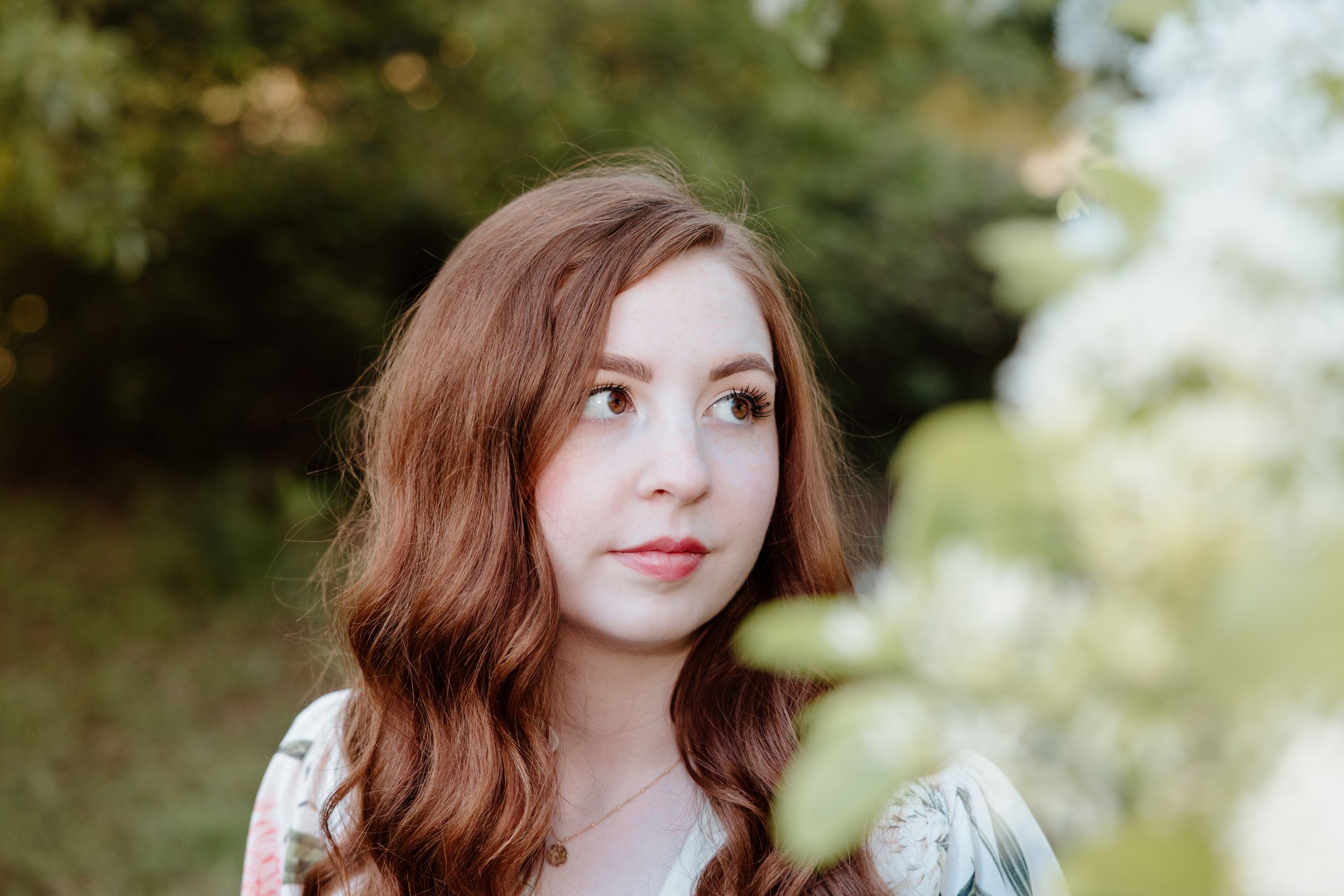 Outdoor Senior Portrait Session in Hampton Park of Charleston, SC