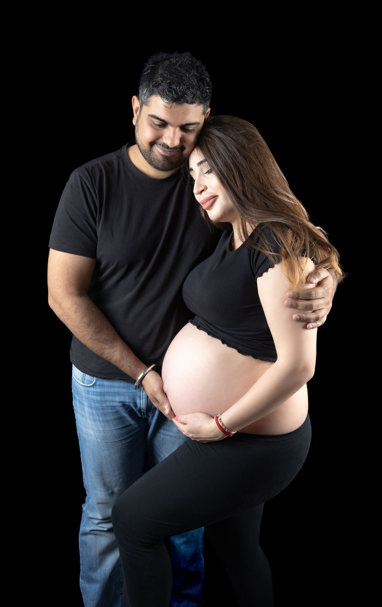 Maternity photography with pregnant lady and her partner.