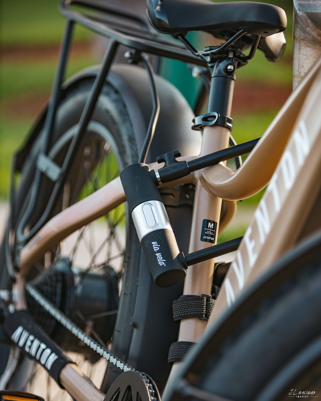 Close-up detail of an electric bike frame and components in natural lighting.