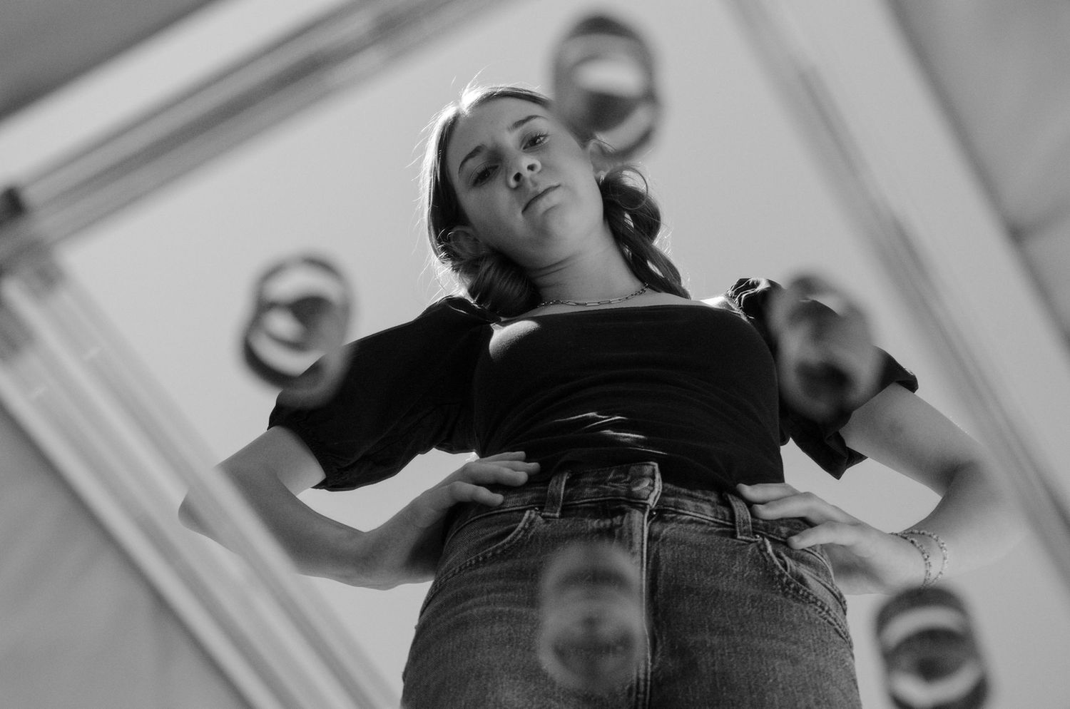 girl looking in mirror