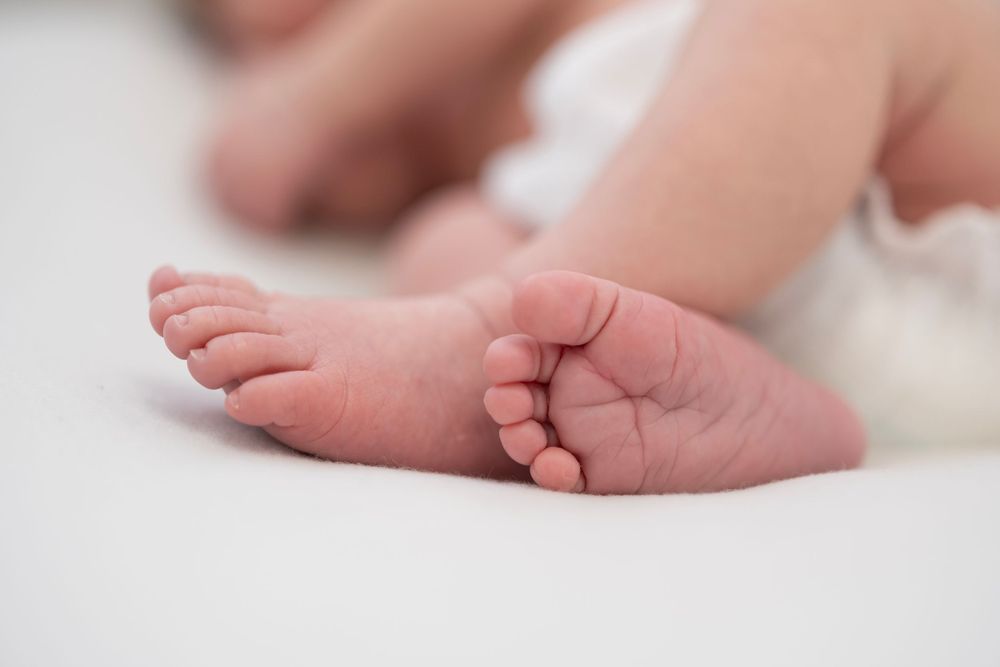 Newborn feet and toes close up macro shot