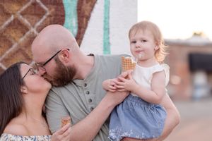 A collage of sweet family moments shows affectionate interactions outdoors during a sunny day.